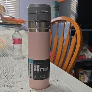 Stanley Pink and Gray Go Bottle Holds Your Drinks And Keeps them  Cold